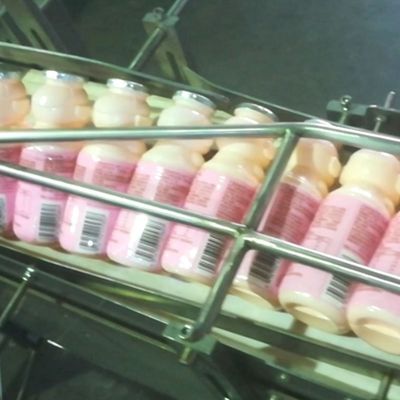 380V Grouping Automatic Screw Feeder Machine Collective Milk Packaging Line